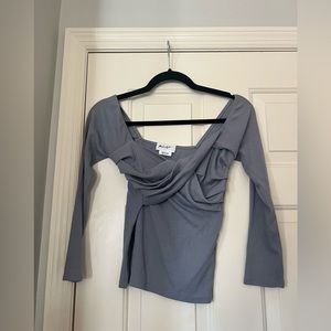 The Line by K going out top